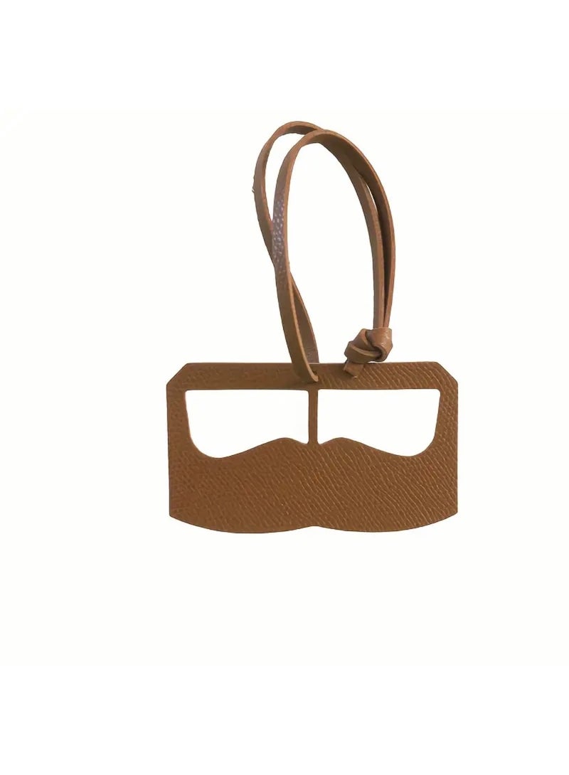 جست كواليتي تعليقات حقائب على شكل نظارات مصنوعة من الجلد الصناعي لتزيين السيارات، وإكسسوارات للحقائب والملابس،. - Image 1